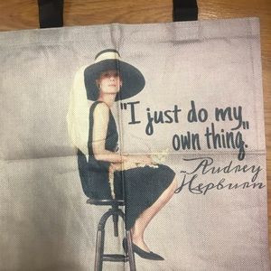 Stylish canvas tote with Audrey Hepburn theme.